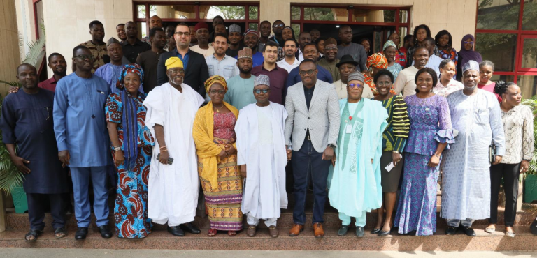 Photo of The Hon. Nasir Isa Kwarra, Commissioners and students at WorldPop/GRID3 workshop