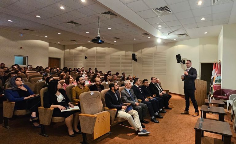 Dr Qader speaking at the Exploring the use of earth observation symposium (University of Sulaimani)