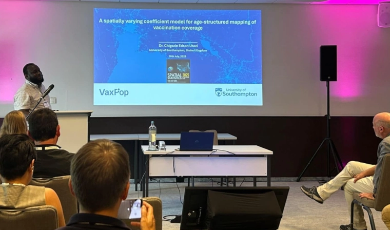 Photo of Dr Edson Utazi presenting at the the 2025 Spatial Statistics Conference