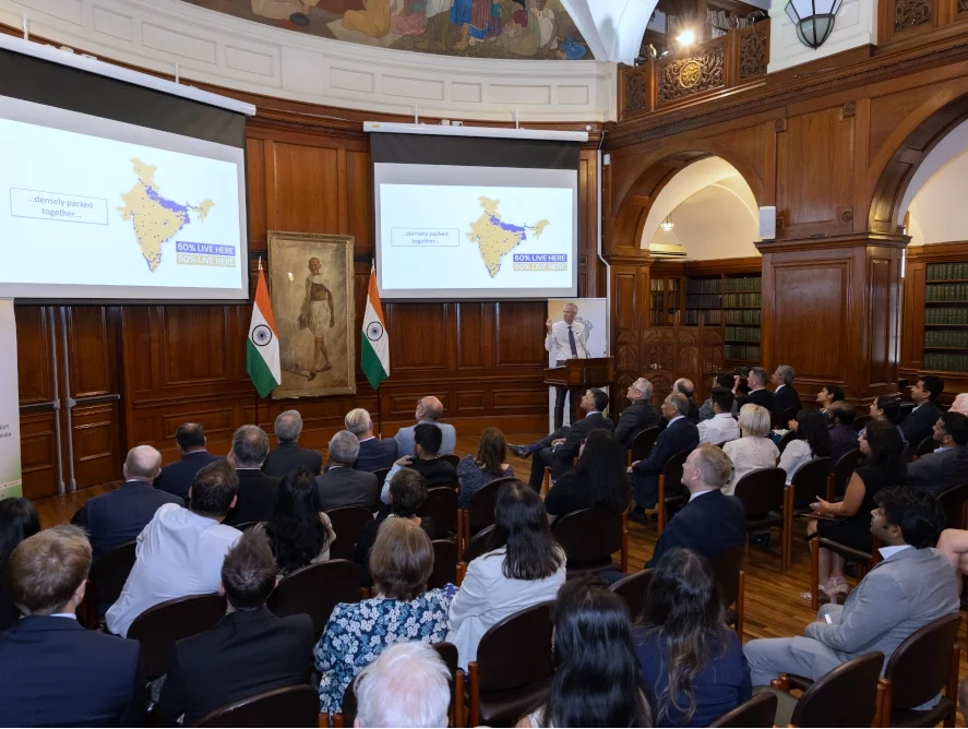 Photo of Professor Andy Tatem presenting WorldPop's work at the Indian High Commission in London. 10 July 2025.