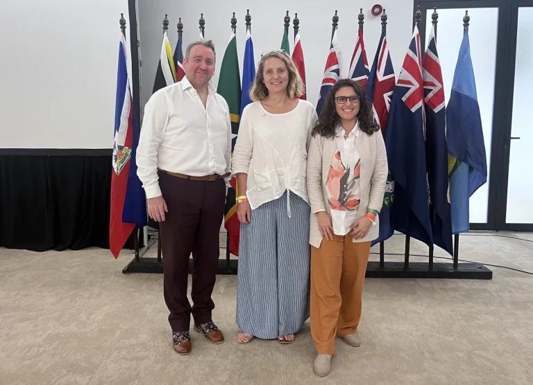 Photo of Ian Coady, Kathryn Baxter and Natalia Tejedor-Garavito at CARICOM 50, Willemstad, Curacao