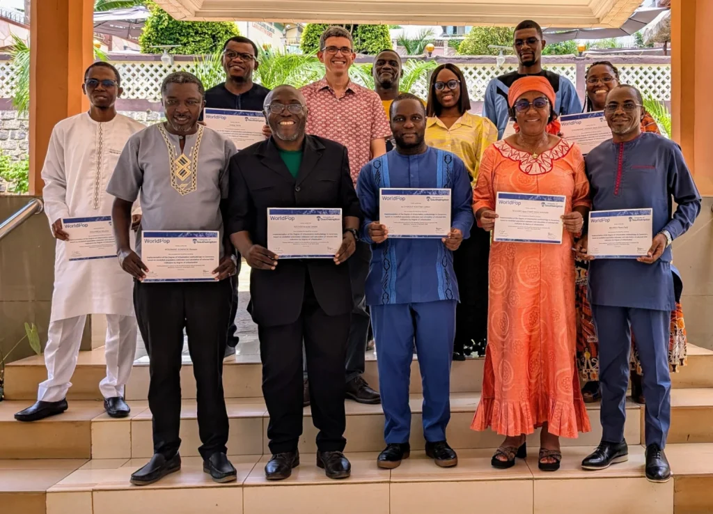 Photo of Cameroon DEGURBA workshop participants with completion certificates.