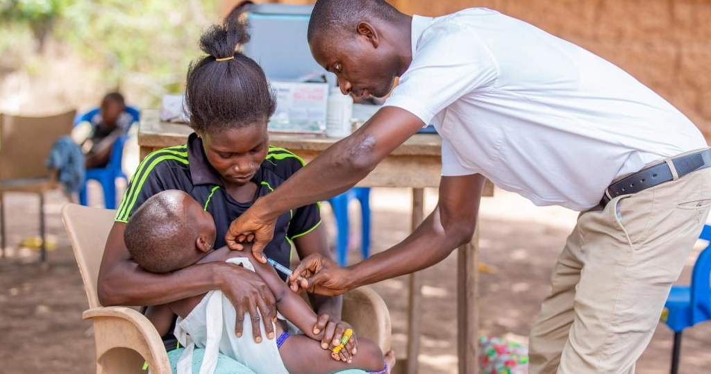 Photo of a child being vaccinated