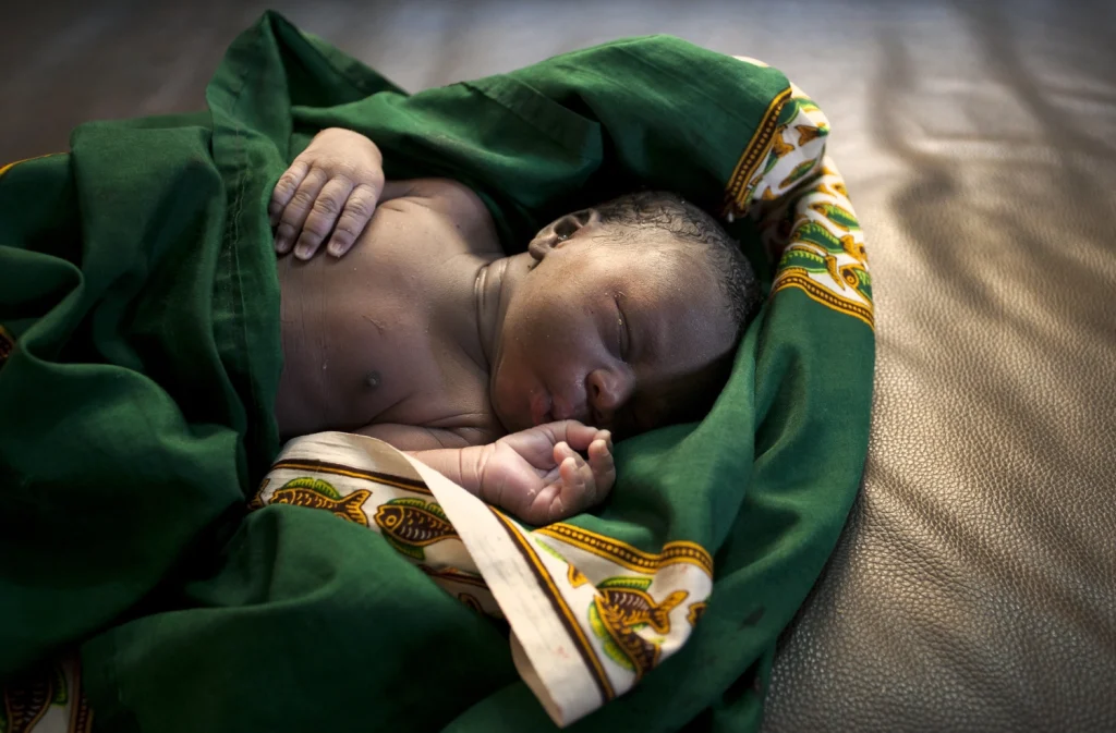 Photo of a newborn boy in a maternity ward