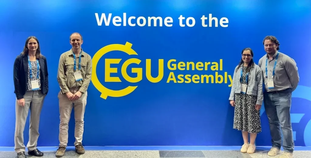 Photo of Dr Thea Woods, Dr Lawrence Hawker, Heather Chamberlain and Dr Evgeny Noi at EGU26 General Assembly