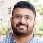 Portrait photo of Dr Shourjya Deb