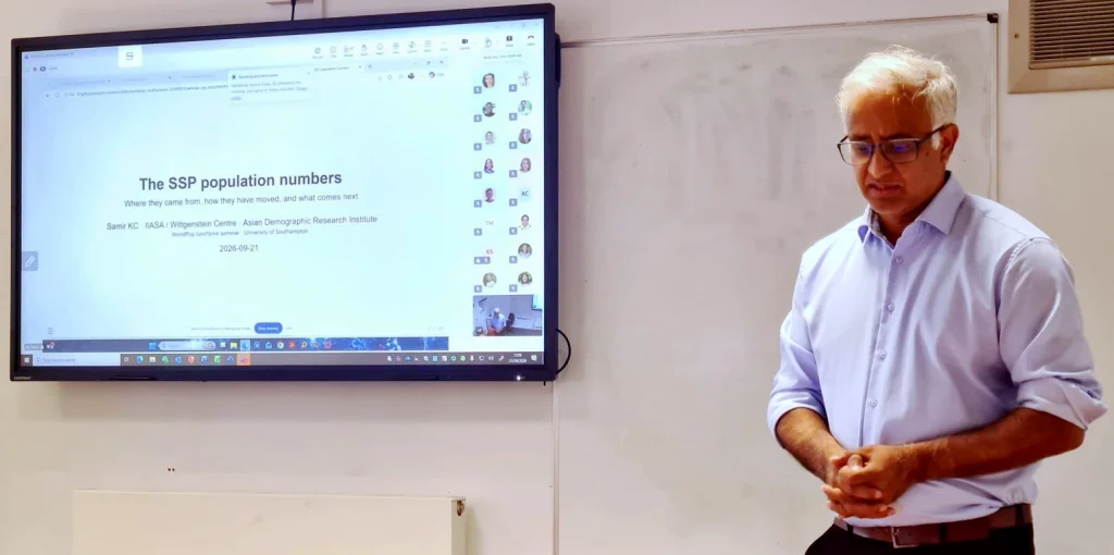 Photo of Professor Samir KC presenting at WorldPop