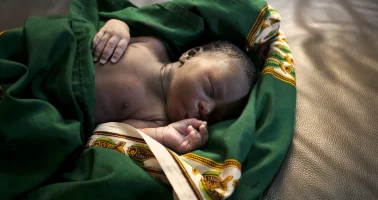Photo of a newborn boy in a maternity ward