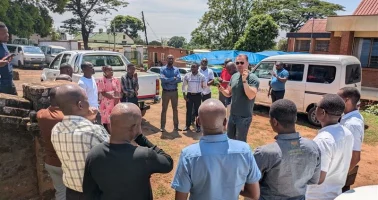 Photo of Dr Sarchil Qader guiding Malawi NSO statisticians on ground data collection
