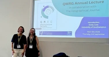 Photo of Dr Jessica Espey with Emily Cole at the QRMG Annual Lecture, 2026.