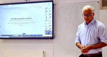 Photo of Professor Samir KC presenting at WorldPop