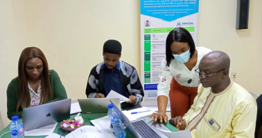 Photo of GIS Analyst Iyanuloluwa Olowe leading a workshop session